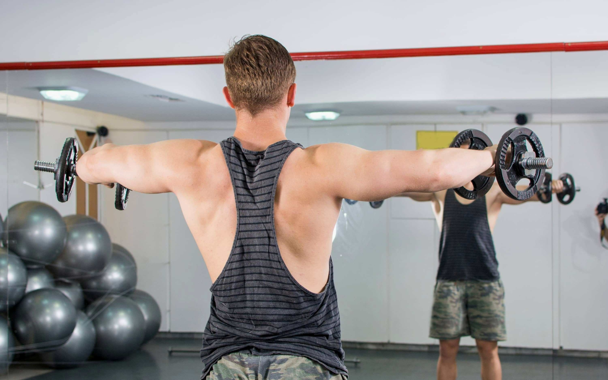 Dumbbell versus cable lateral raises what makes the difference